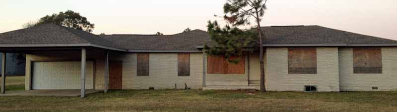 We buy vacant houses that have been empty for years, such as the house in this photo.